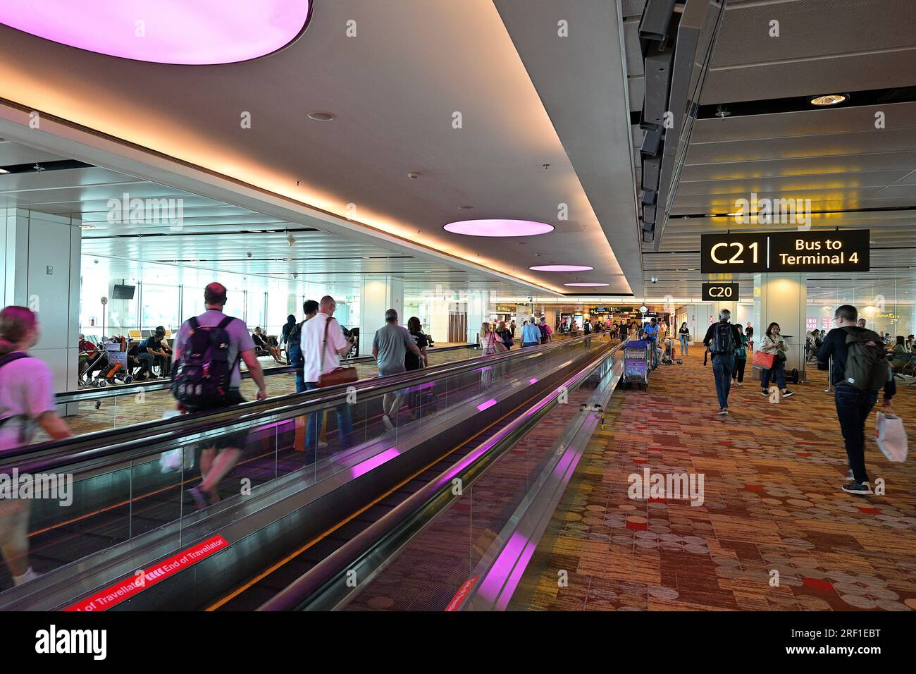 Travelators at Changi Airport Terminal 1, Singapore, with Arrival Hall in the background, July 2023 Stock Photo