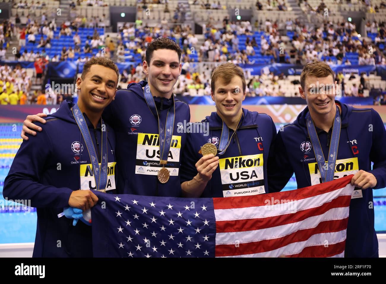 Team USA celebrate with their gold medals for the Men's 4 x 100m Medley