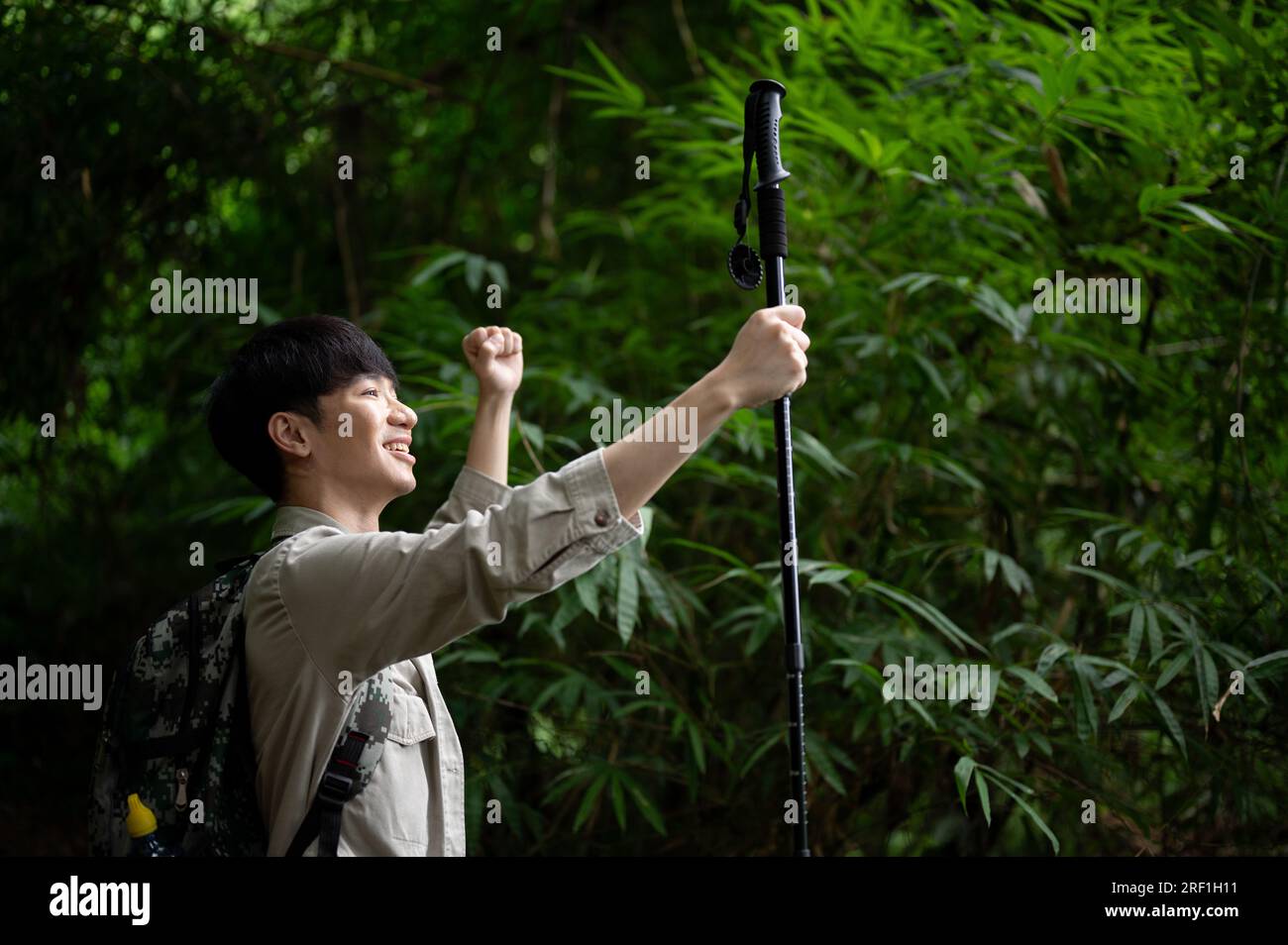 Cheerful explorer in jungle hi-res stock photography and images - Alamy