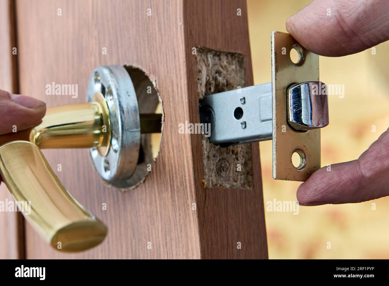 Repair of lever door handle with latch Stock Photo Alamy
