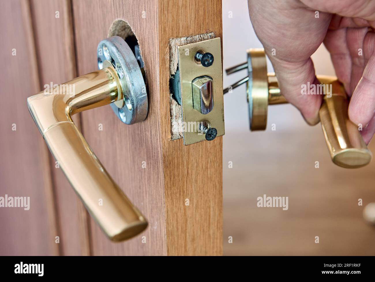 Assembling lever door handle with latch for an interior door Stock Photo Alamy