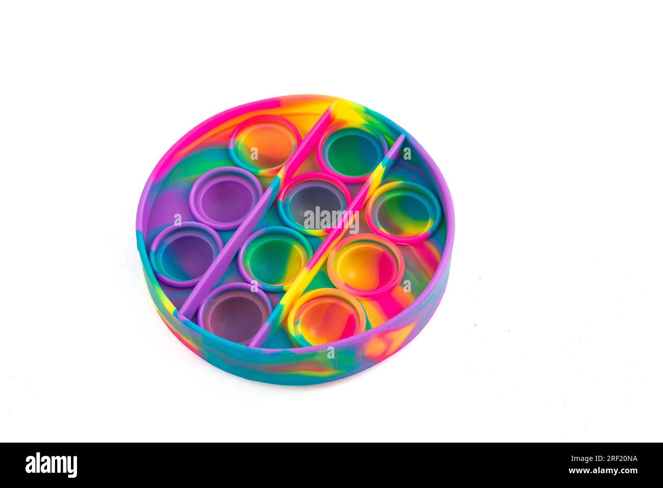 Multi-colored popular silicone anti-stress toy pop it. Colorful anti stress sensory toy fidget push pop it. Stock Photo