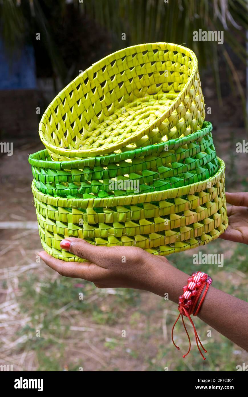 Environmental friendly colourful palm leaf baskets at Manapad near
