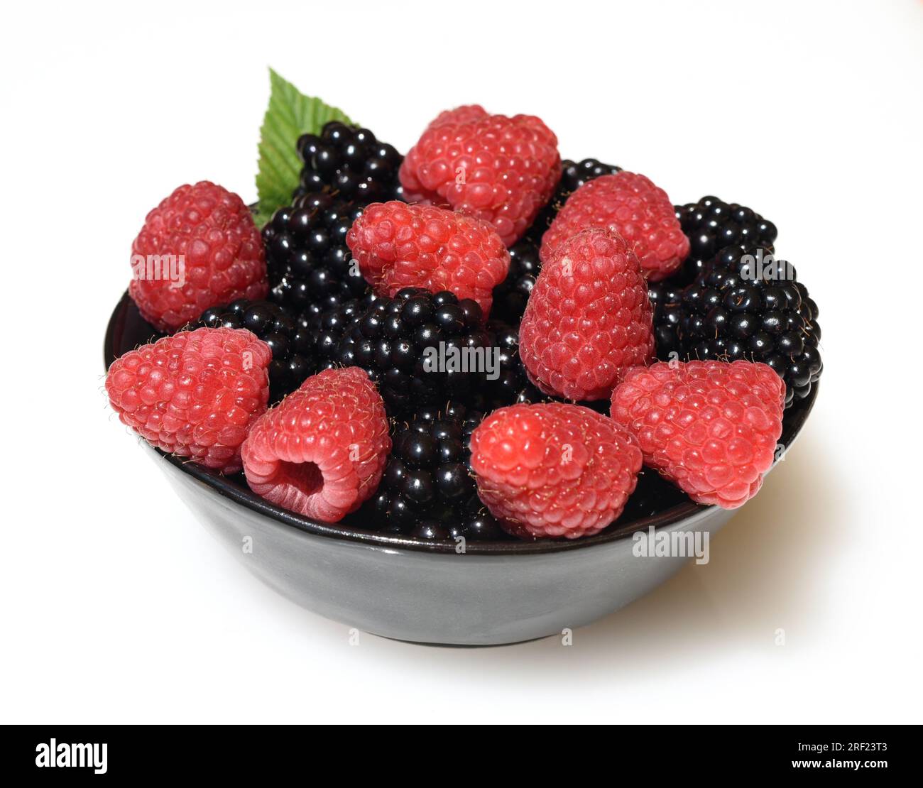 Raspberries, Rubus idaeus, is a tasty berry plant with red berries. Stock Photo