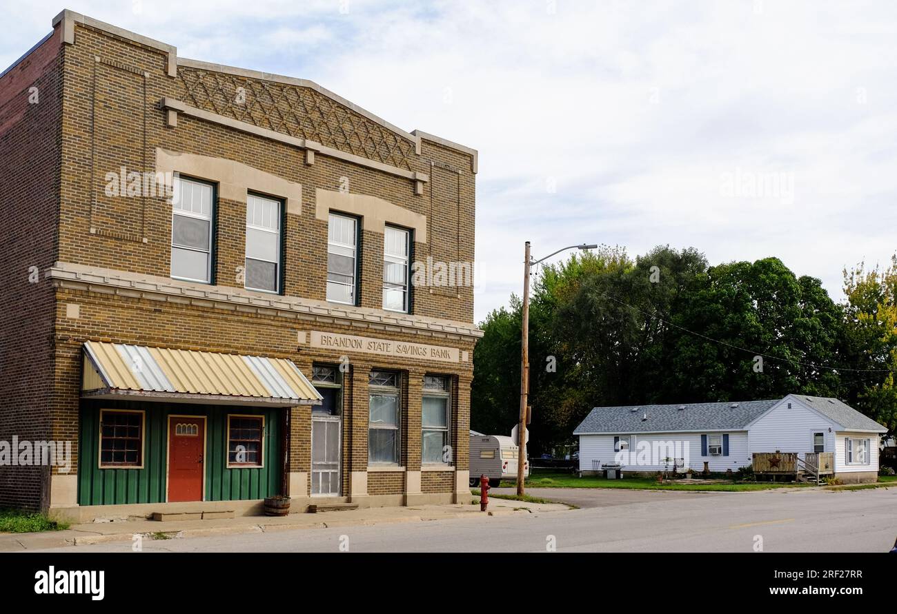 An old building of a former state bank with a sign Brandon State Service Bank in Brandon, Iowa, United States. Stock Photo