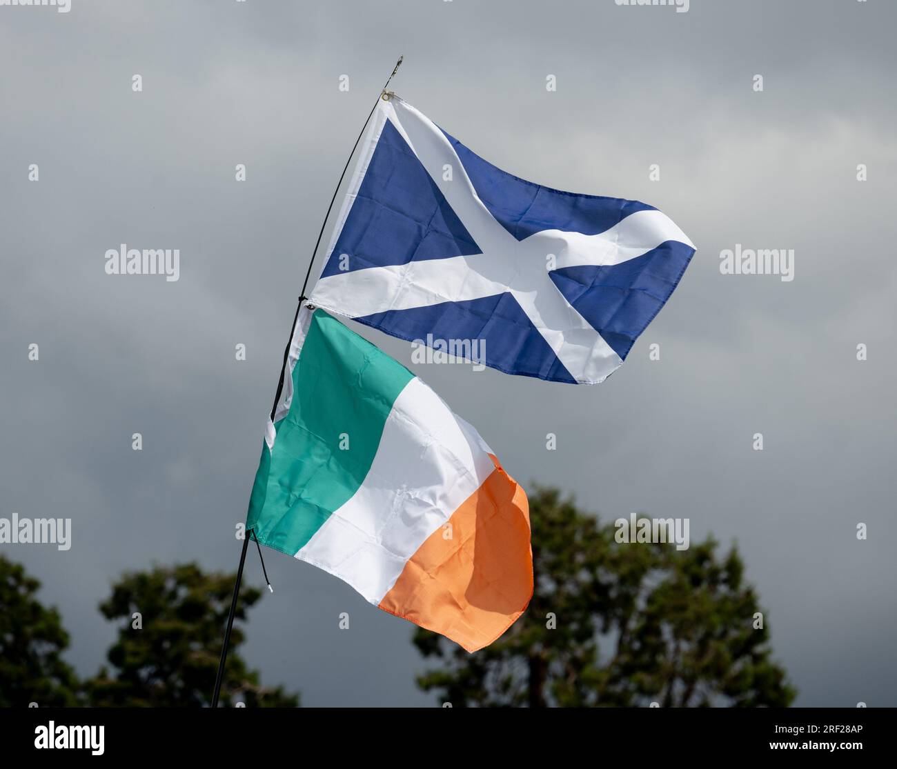 Scottish and Irish flags Stock Photo Alamy