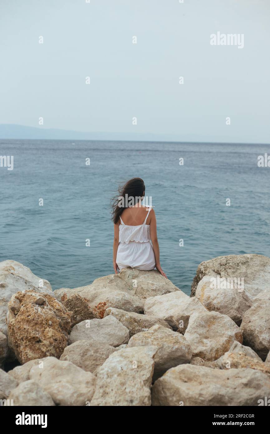 Back view of young woman with hi-res stock photography and images - Alamy