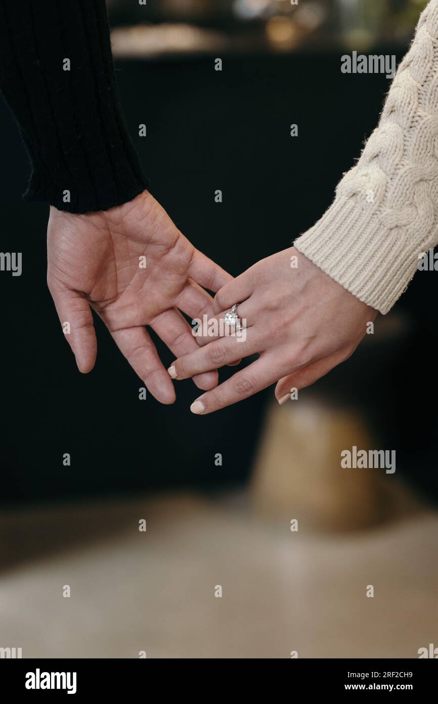 Couple holding hands Stock Photo