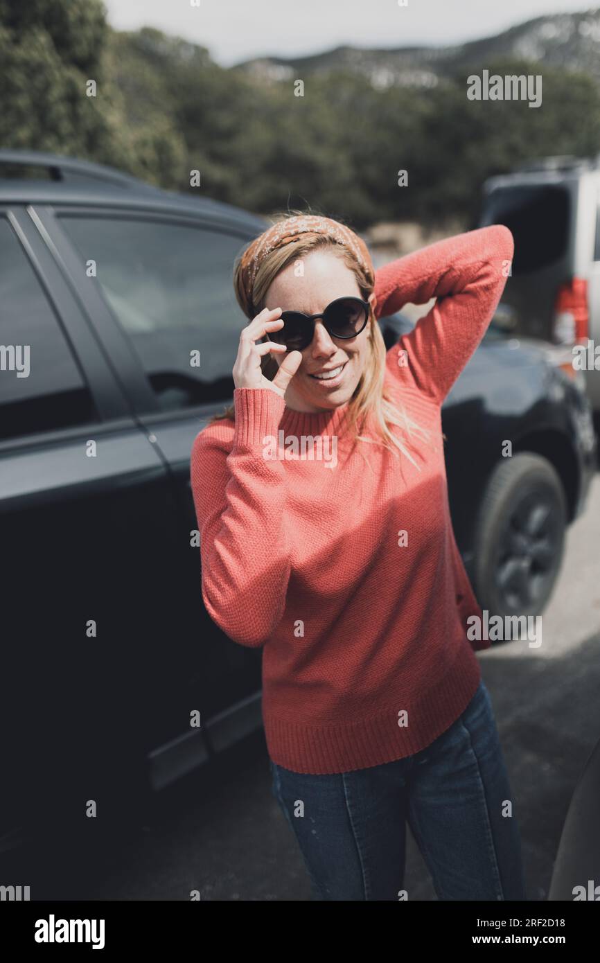Woman in red sweater on hi-res stock photography and images - Alamy