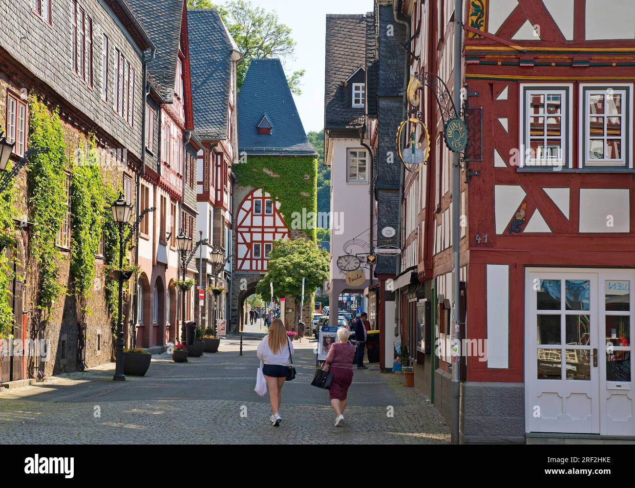 town hall with half-timbered houses and town gate Leonhardsturm in the historic old town, Germany, Hesse, Herborn Stock Photo