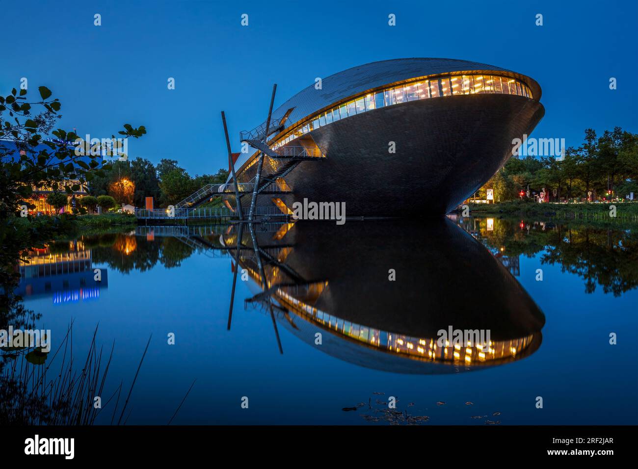The Universum Science Center Museum building seen at the blue hour. Photo was taken on the 3rd of June 2023 in Bremen or the German state free Hanseat Stock Photo