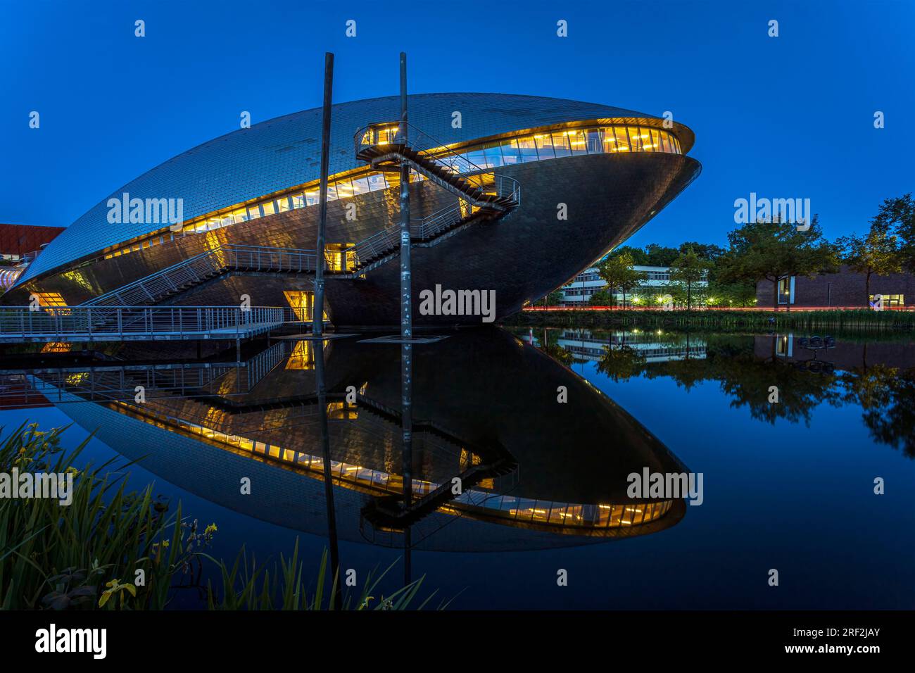 The Universum Science Center Museum building seen at the blue hour. Photo was taken on the 3rd of June 2023 in Bremen or the German state free Hanseat Stock Photo