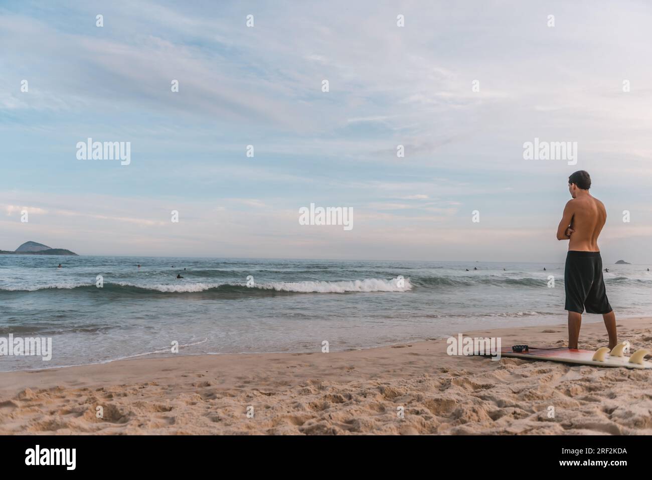 Young man waiting for the perfect wave in Rio de Janeiro Brazil Stock ...