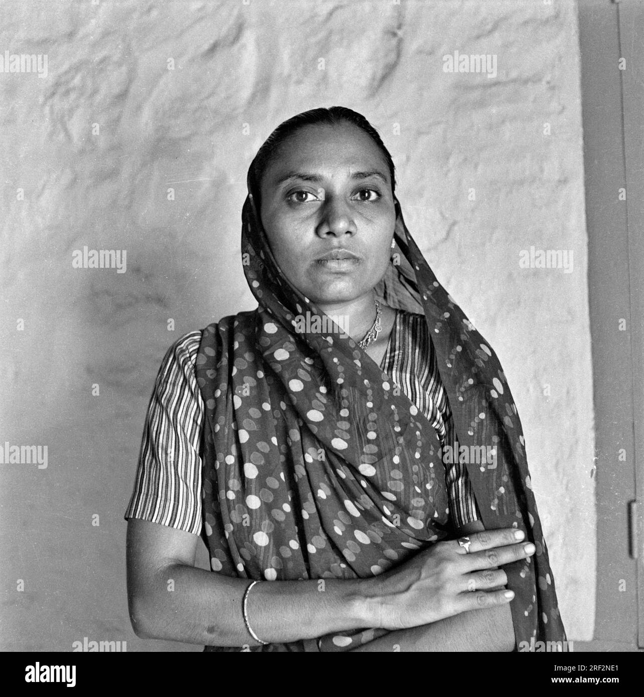 old vintage 1900s black and white studio portrait of Indian woman