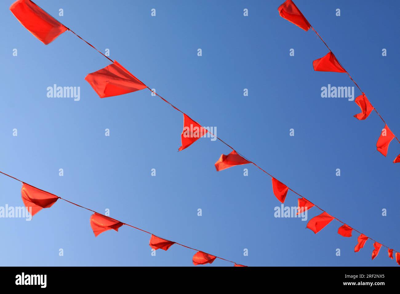 red ribbons flying in the blue sky Stock Photo