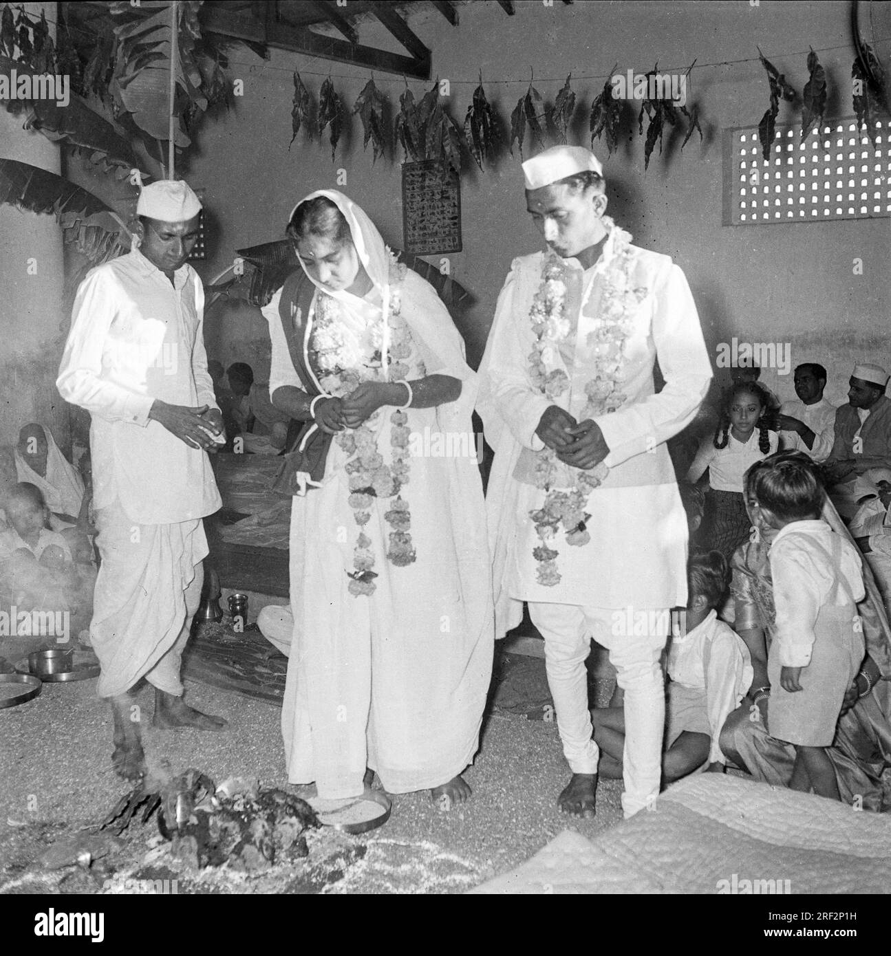 Old Vintage 1900s Black And White Picture Of Indian Wedding Marriage Ceremony Bride Bridegroom