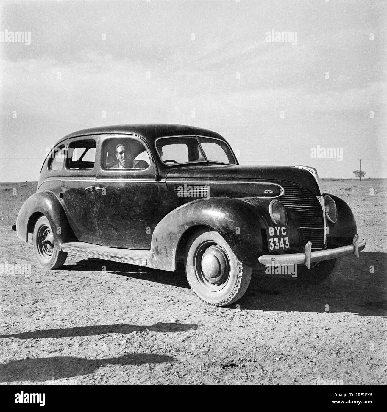 old vintage 1900s black and white picture of Ford Mercury 1938 car BYC 3343 India Stock Photo