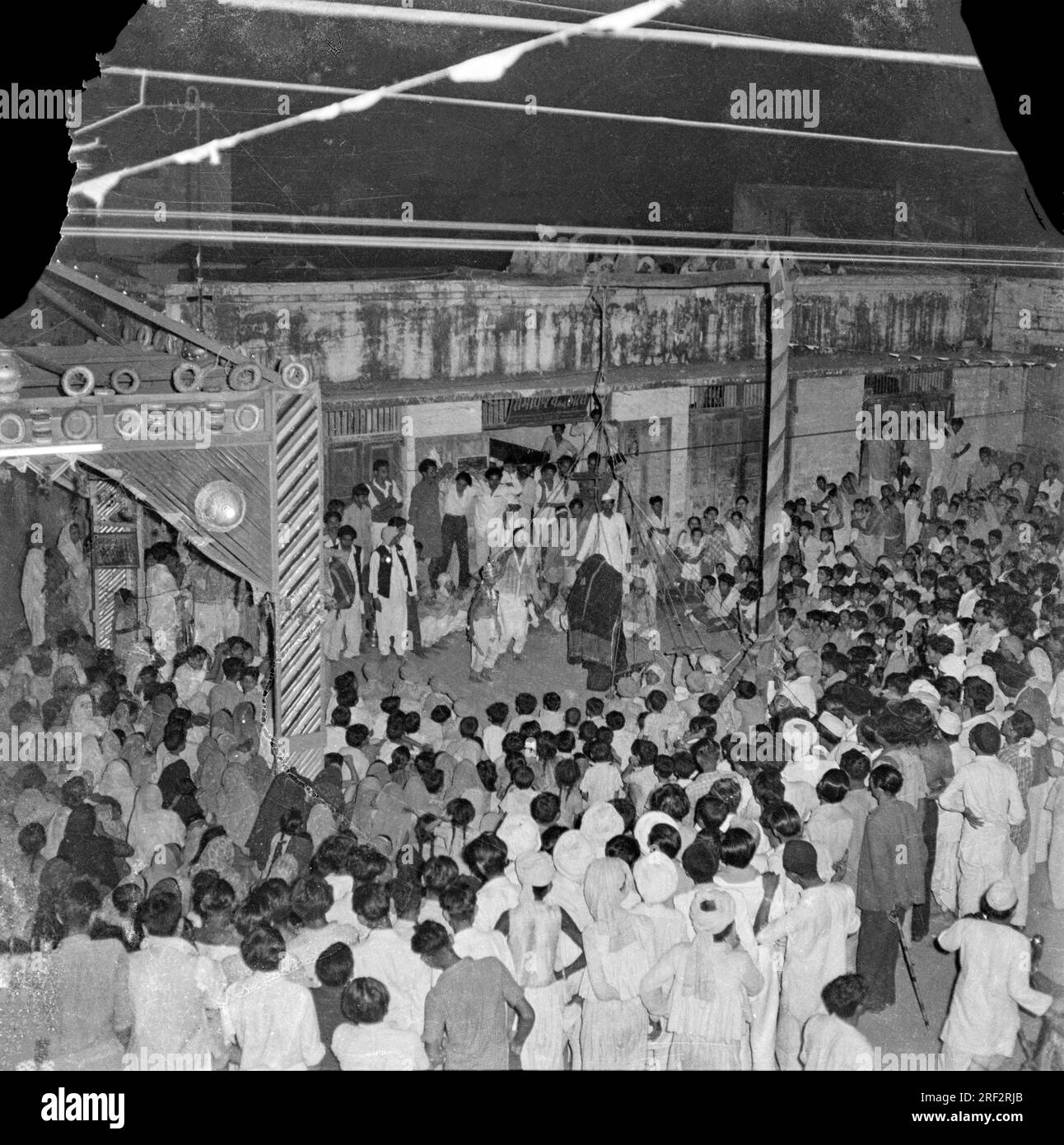 old vintage black and white 1900s picture of Indian village rural crowd India 1940s Stock Photo