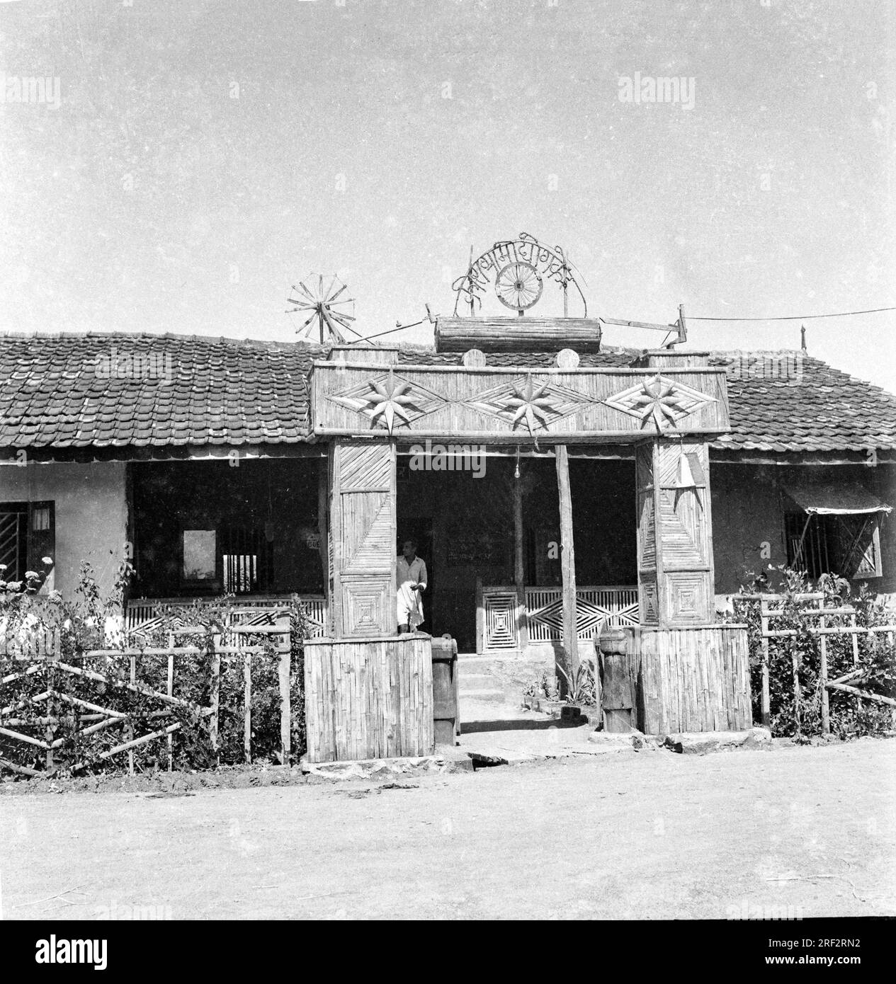 old vintage 1900s black and white picture of Indian rural village fair handicrafts shop Kora Gramodyog Kendra India 1940s Stock Photo