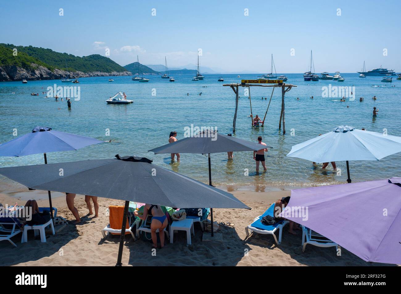 Dubrovnik, Lopud, Croatia, Beach Scene, Umbrellas, Crowd People, Tourists Visiting Adriatic Sea