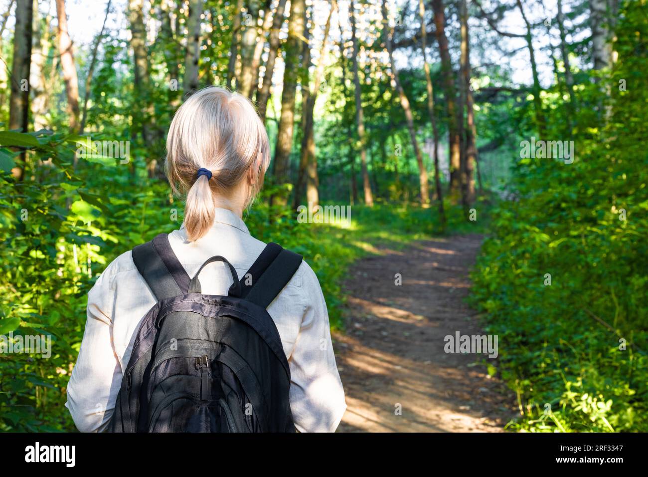 Black man walks through forest hi-res stock photography and images - Alamy