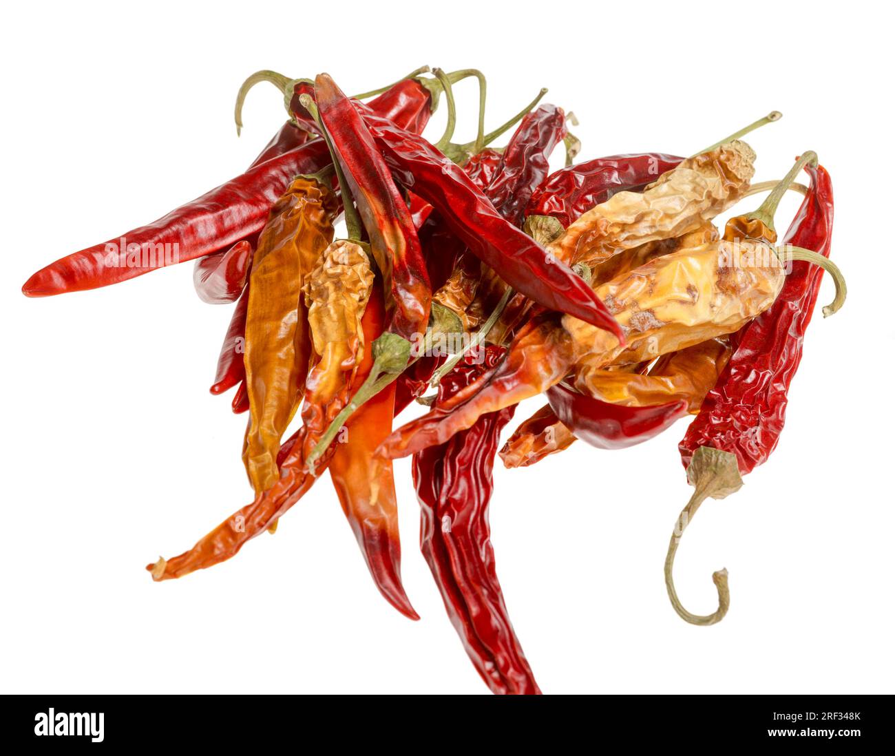 pile of red and yellow chili peppers in white back Stock Photo Alamy