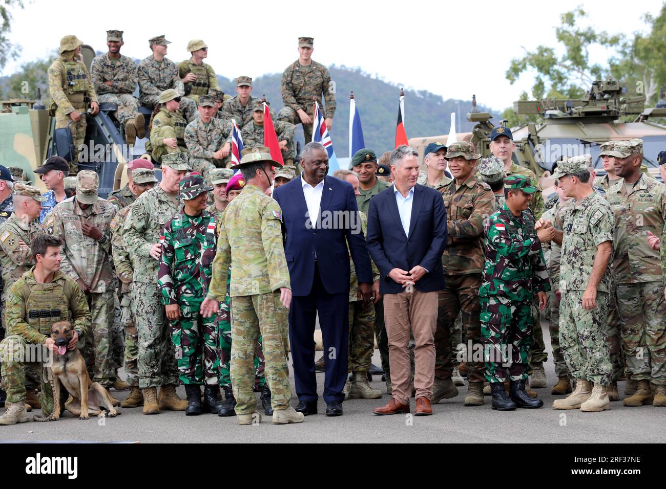 Townsville, Australia. 30th July, 2023. U.S Secretary of Defense Lloyd Austin, left center, and Australian Defense Minister Richard Marles, center right, join a group photo with multinational soldiers taking part in exercise Talisman Sabre at Lavarack Barracks, July 30, 2023 in Townsville, Queensland, Australia. Credit: Sgt 1C John Healy/U.S. Army Photo/Alamy Live News Stock Photo