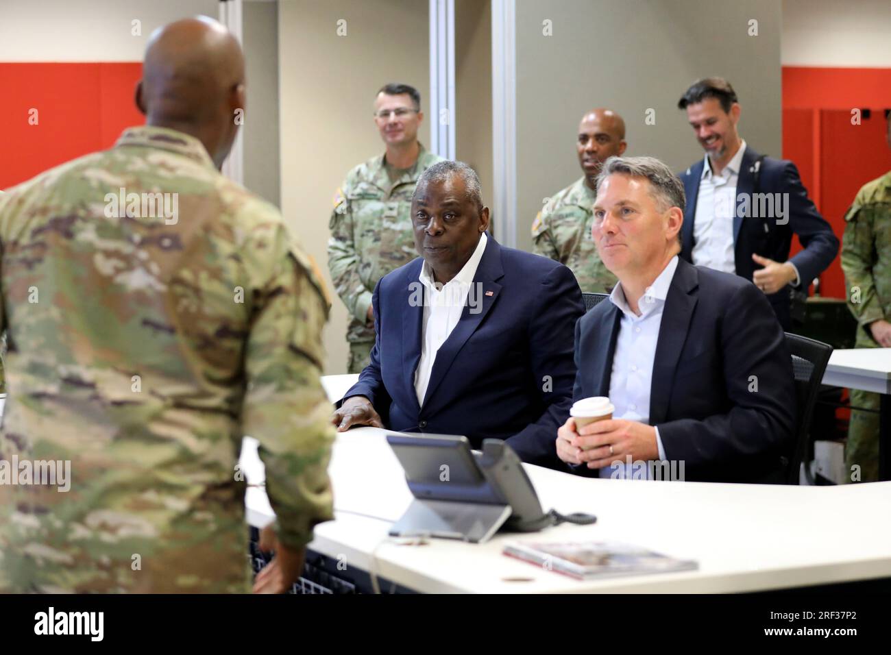 Townsville, Australia. 30th July, 2023. Australian Defense Minister Richard Marles, right, and U.S Secretary of Defense Lloyd Austin, center, are briefed by U.S Army Lt. Gen. Xavier Brunson, left, on the multilateral military exercise Talisman Sabre at Lavarack Barracks, July 30, 2023 in Townsville, Queensland, Australia. Credit: Sgt 1C John Healy/U.S. Army Photo/Alamy Live News Stock Photo