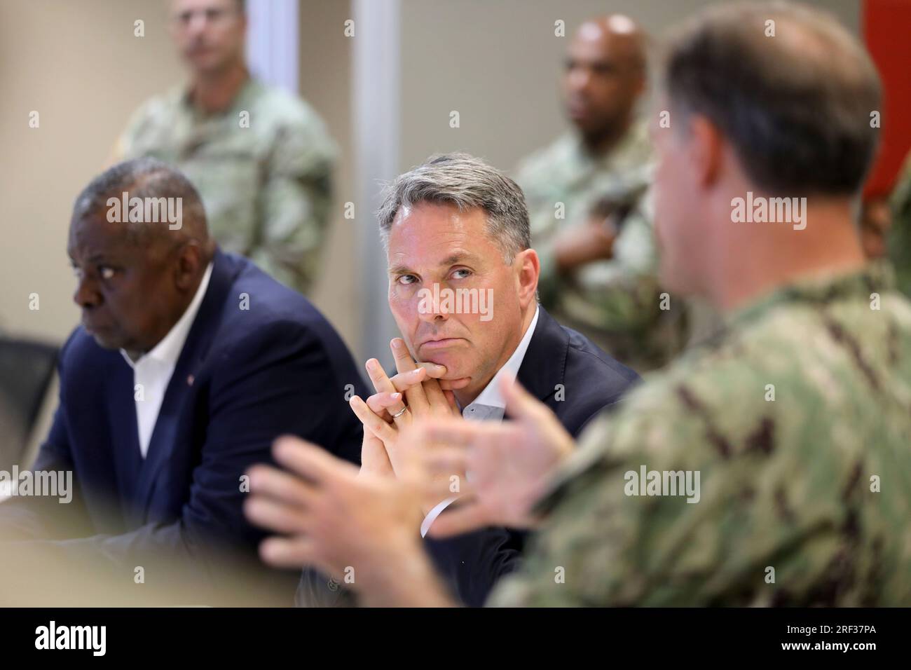 Townsville, Australia. 30th July, 2023. Australian Defense Minister Richard Marles, center, and U.S Secretary of Defense Lloyd Austin, left, are briefed on the multilateral military exercise Talisman Sabre at Lavarack Barracks, July 30, 2023 in Townsville, Queensland, Australia. Credit: Sgt 1C John Healy/U.S. Army Photo/Alamy Live News Stock Photo