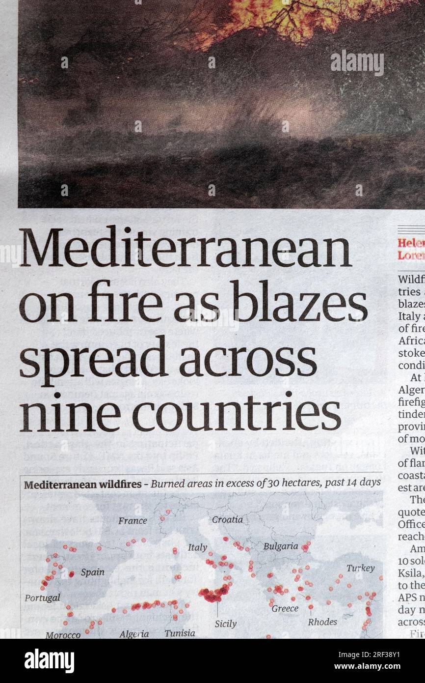 'Mediterranean on fire as blazes spread across nine countries' Guardian newspaper headline front page Europe wildfires article on 27 July 2023 Stock Photo