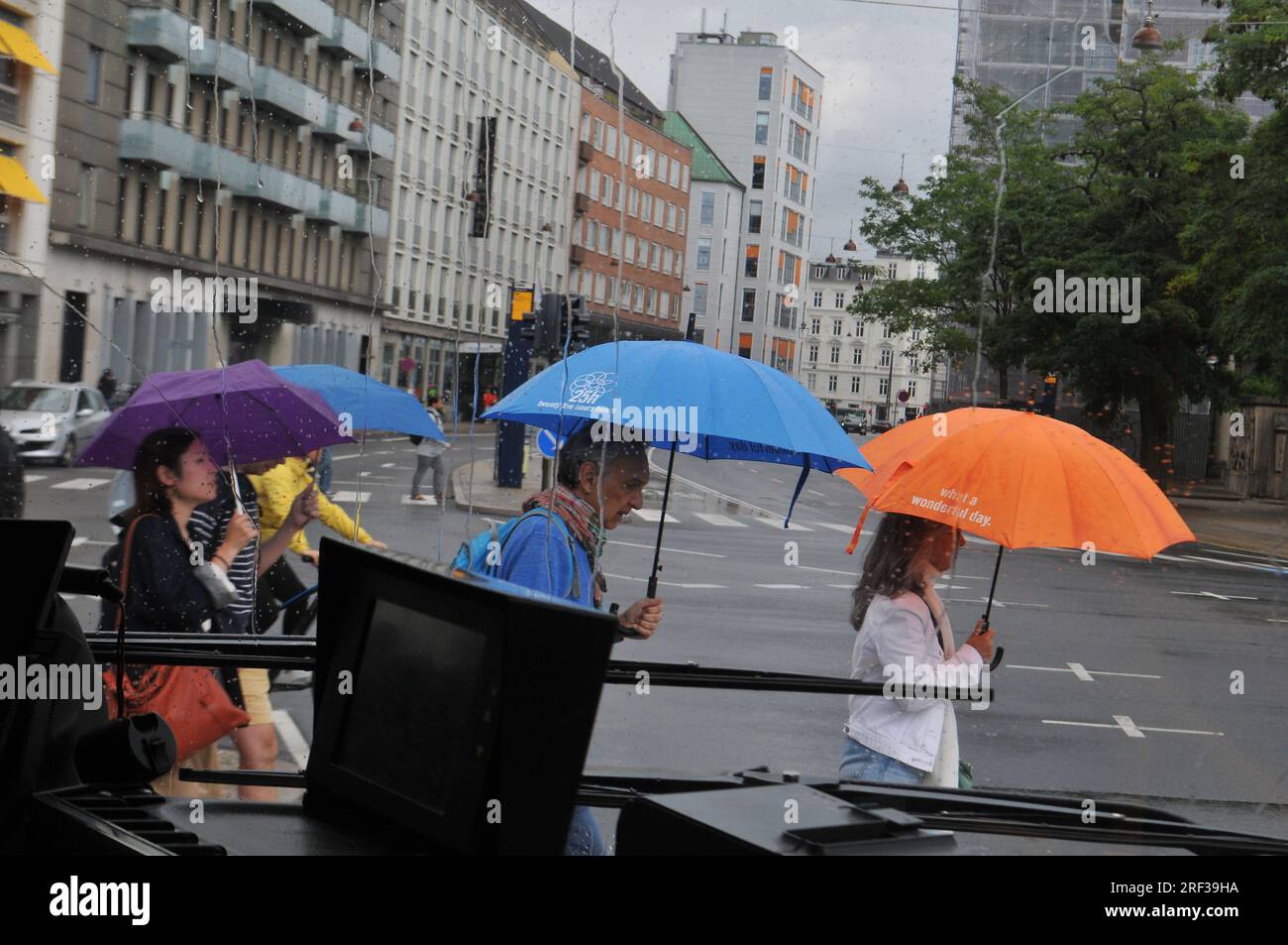 31July 2023/ weather tourists in rainy weather capital Copenhagen Denmark. (Photo.Francis Joseph