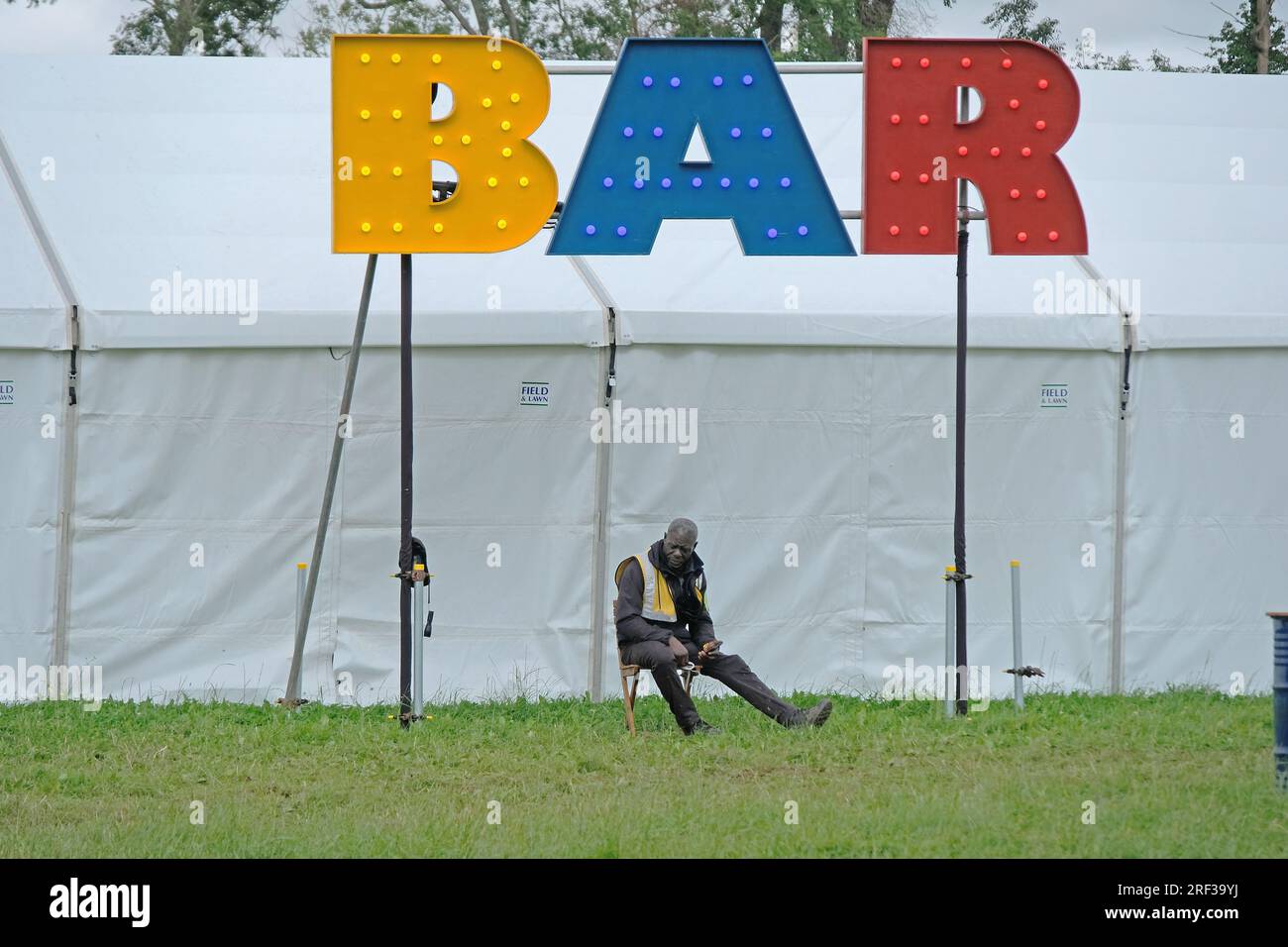 Security Guard Parade A security guard at a festival before opening Stock Photo - Alamy