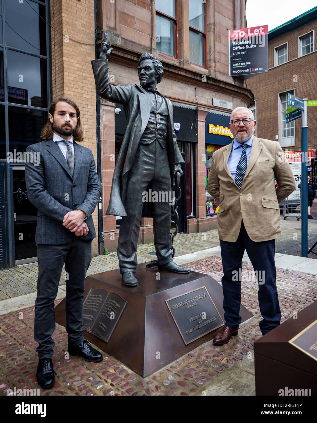 Sculptors Hector Guest (left) and Alan Herriot standing beside the