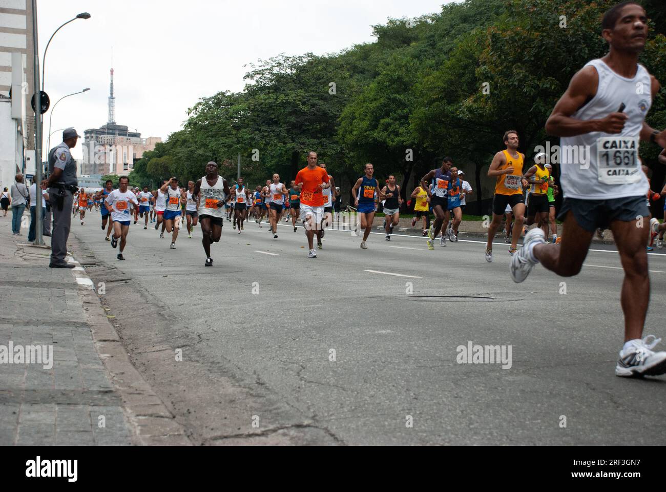 Group of people participating in the Saint Sylvester Road Race at Rua Consolação, São Paulo. Brazil Stock Photo