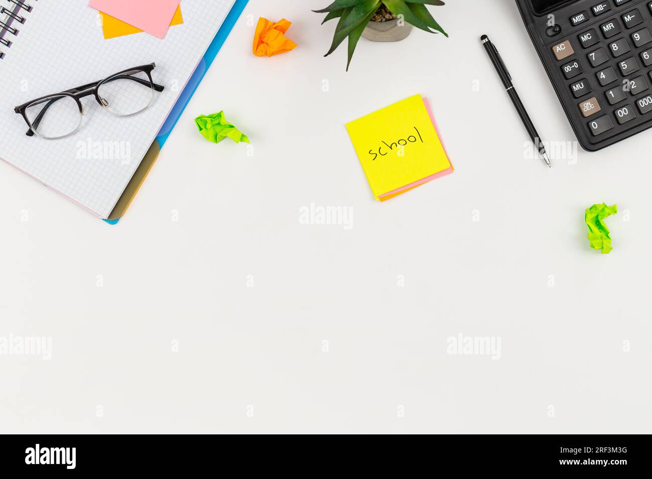 White background with school supplies, top view. Stock Photo