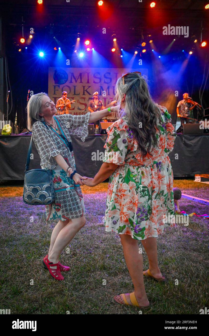 Women dancing at Music Festival Stock Photo - Alamy