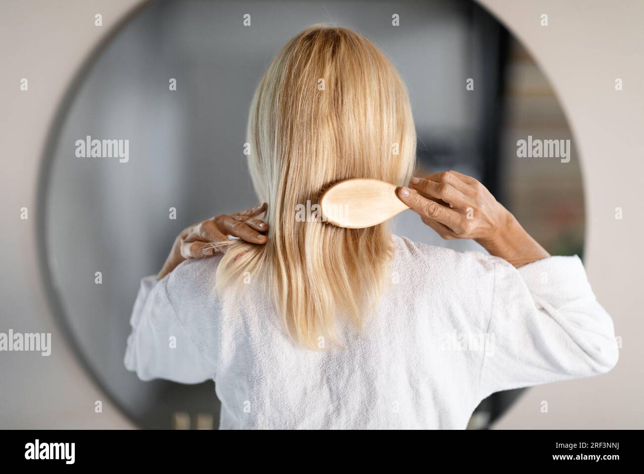 Mature woman rear view mirror hi-res stock photography and images - Alamy