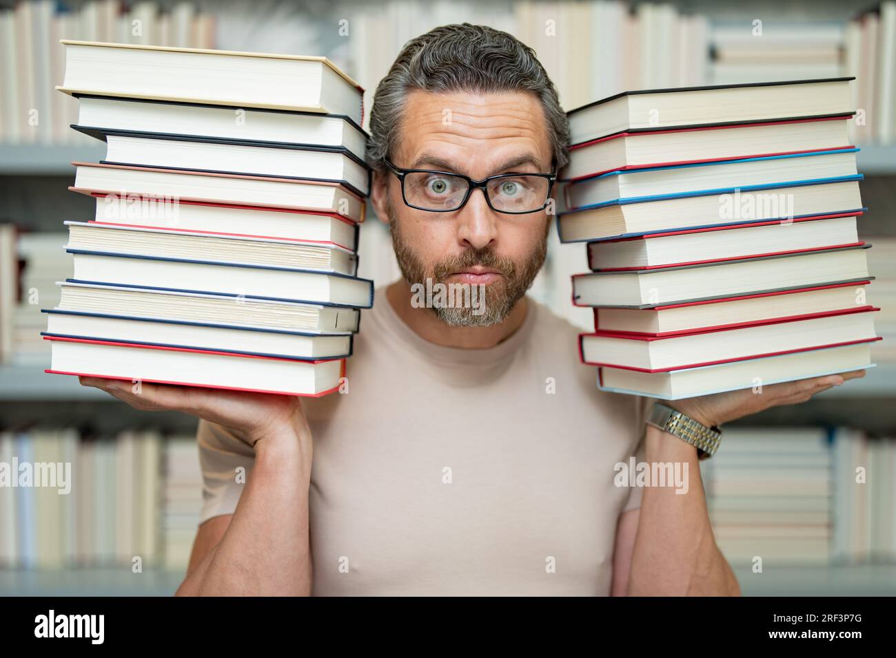 Teachers day. Teacher in school classroom. Knowledge and education with middle aged teacher. Millennial teacher with book. Teachers from university ex Stock Photo