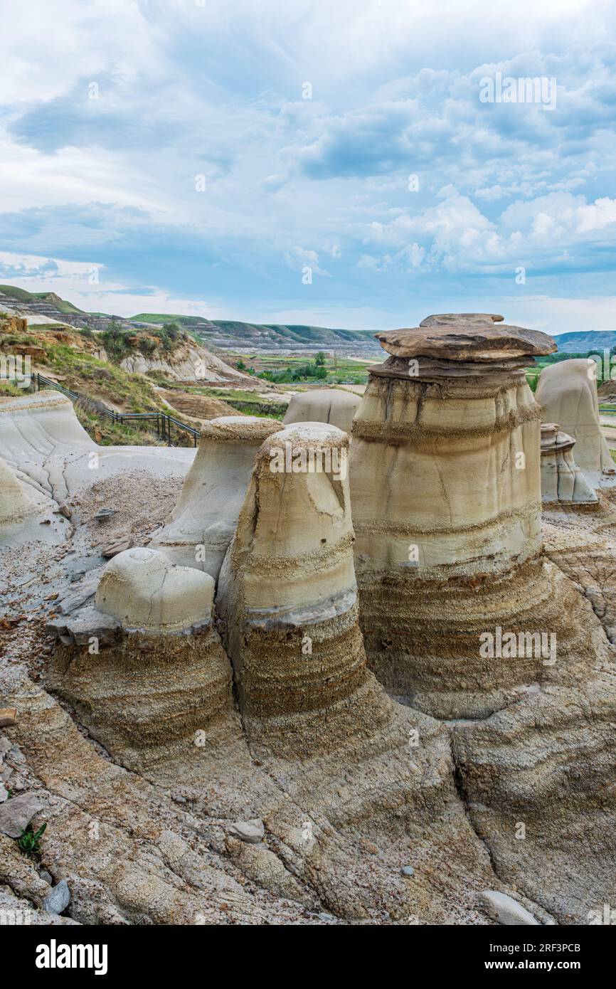 The Hoodoos are are popular sightseeing destination in Drumheller Alberta cosidting of sandstone colums that have been formed through erosion caused b Stock Photo