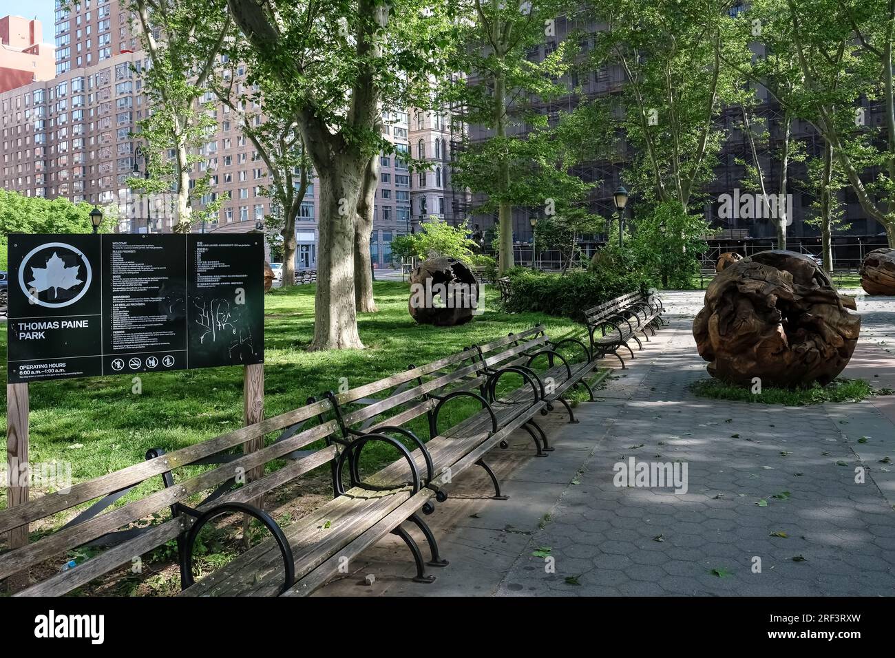 View of Thomas Paine Park, a small triangular park located in the Civic Center neighborhood of Lower Manhattan, New York City Stock Photo