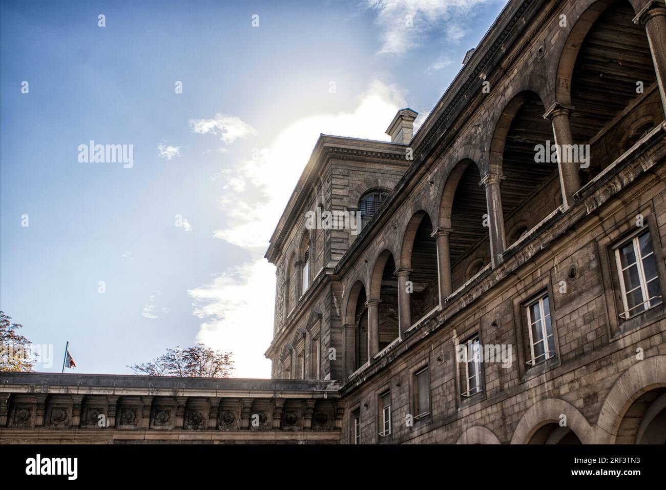 Exterior image of the Paris Mental Asylum. Pitié-Salpêtrière was the dumping grounds for women who received the dreaded diagnosis of 'hysterical'. Female beggars, prostitutes, crazies, orphans, libertines, protestants, cripples, Jews, criminals, alcoholics, moribunds, witches,  blind, girls born of adultery, lesbians, epileptics, thieves, sorcerers, seniles, and others. Parisian women of the 1700s could be labeled any one of those things, true or false, branded hysterical, and regardless of her social status could be sent away into the dingy halls of the asylum forever. France. Stock Photo