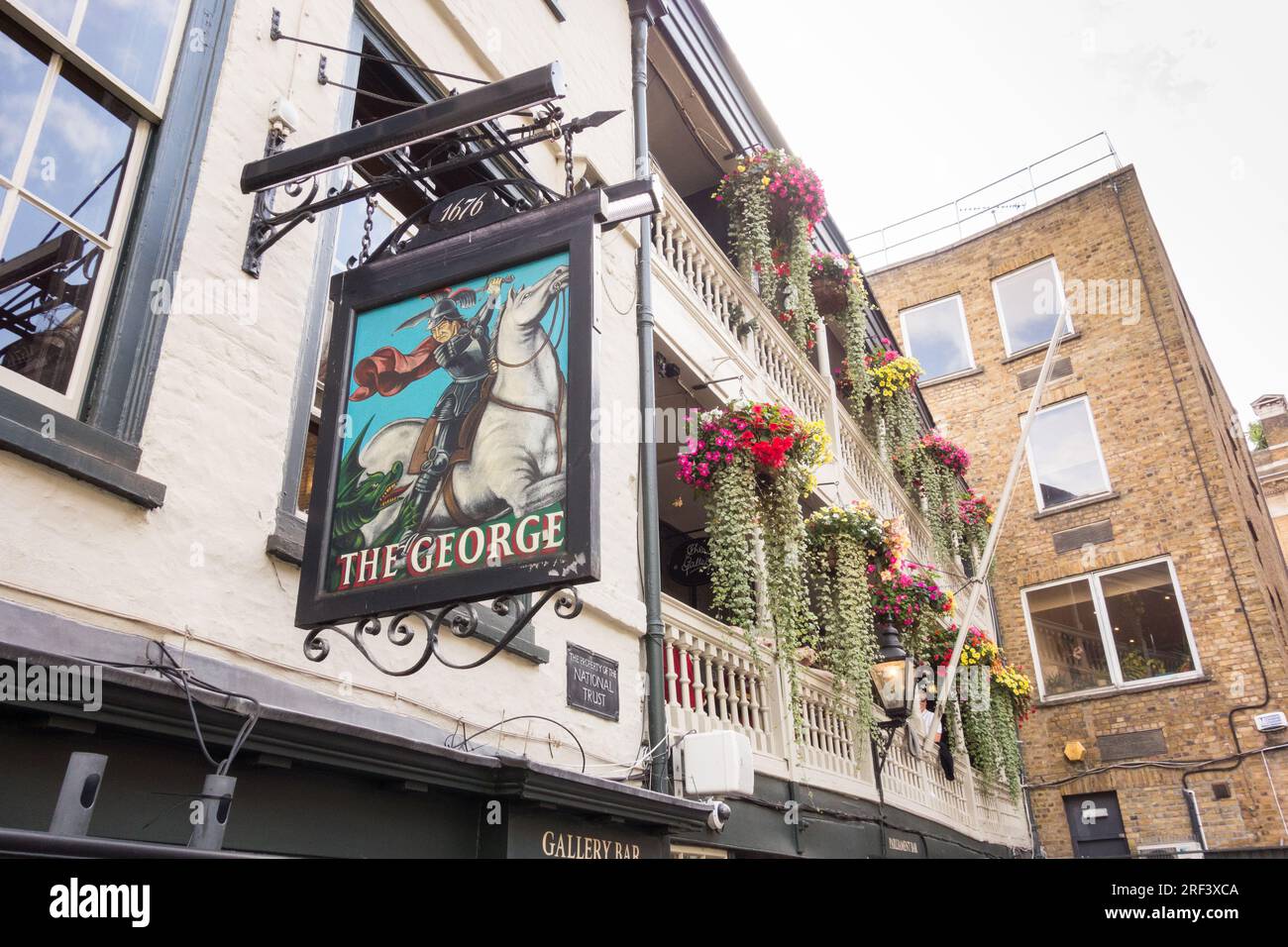 Closeup of the George Inn pub sign off Borough High Street, Southwark, London, England, UK Stock Photo
