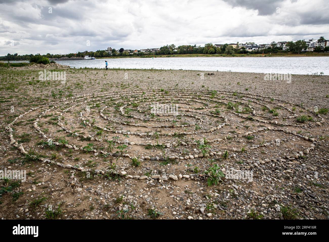 stone labyrinth on the banks of the river Rhine in Rodenkirchen-Weiss, Cologne, Germany. Steinlabyrinth am Rheinufer in Rodenkirchen-Weiss, Koeln, Deu Stock Photo