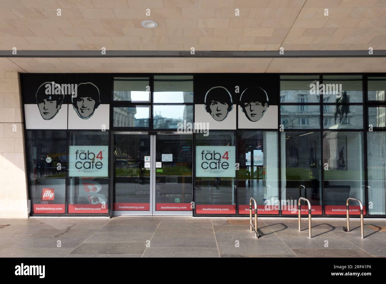 Entrance to the Fab 4 Cafe, related to the Beatles Museum, in the Modernist Pier Head Ferry Terminal Building (2009) on the Waterfront Liverpool UK Stock Photo