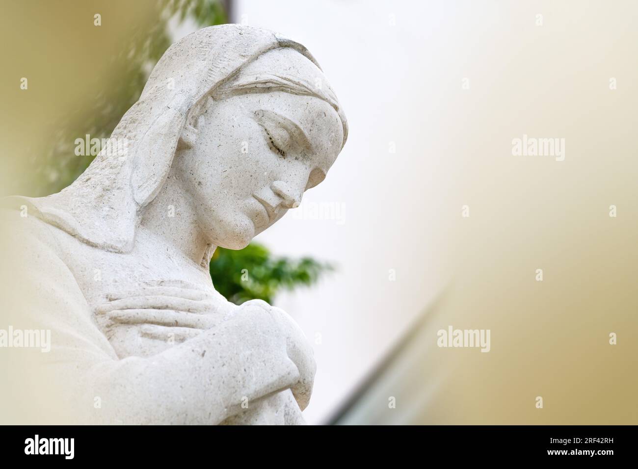 Crikvenica, Croatia - July 20, 2023: Virgin Mary statue in front of the Church of the Assumption of the Blessed Virgin Mary Stock Photo