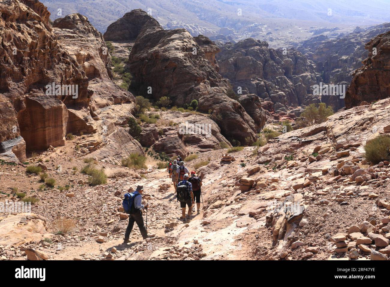People on the Al Khubtha trail down to Petra city, UNESCO World Heritage Site, Wadi Musa, Jordan, Middle East Stock Photo