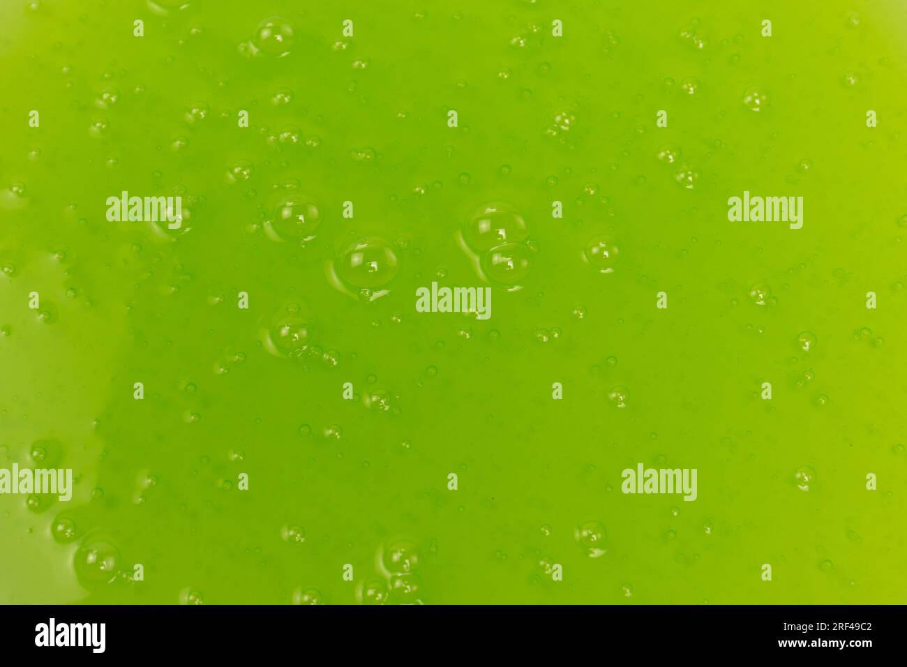 Green slime toy as a background. Top view Stock Photo - Alamy