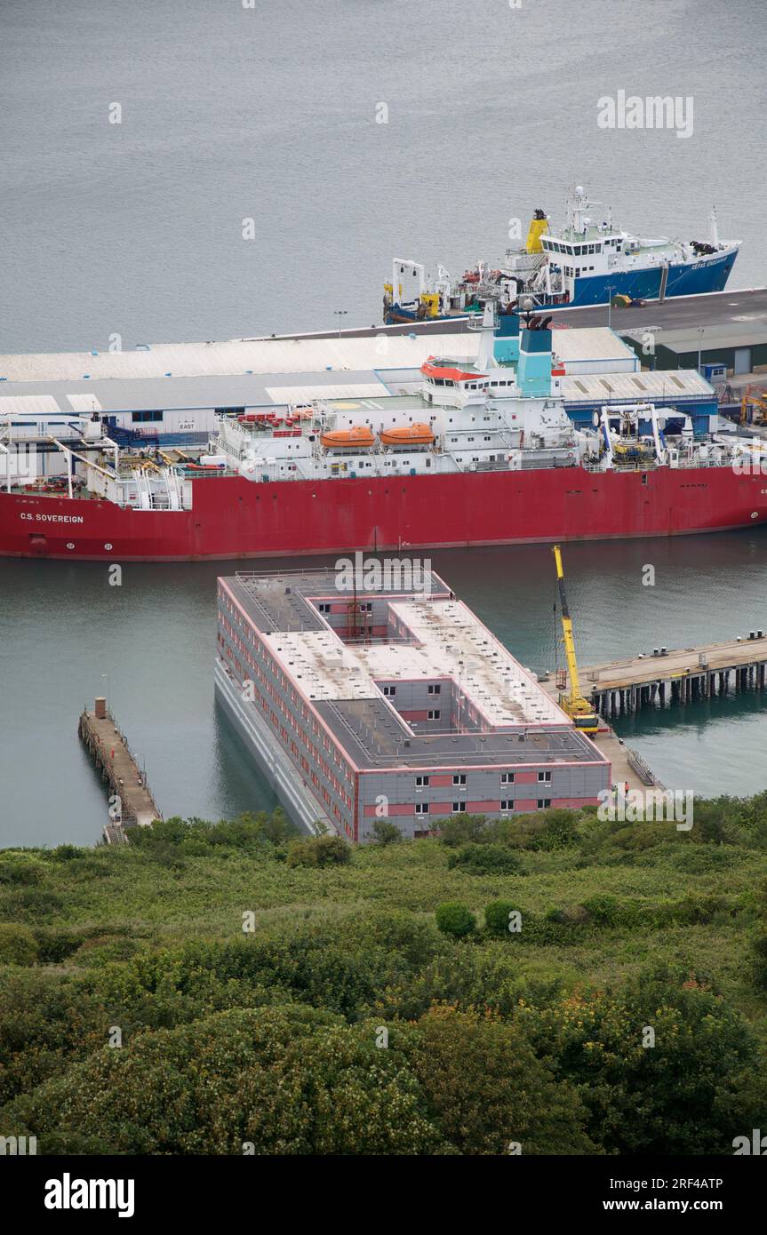 On 18 July 2023 the controversial accommodation barge Bibby Stockholm was moored in Portland Harbour to house 500 migrants and asylum seekers. Dorset. Stock Photo