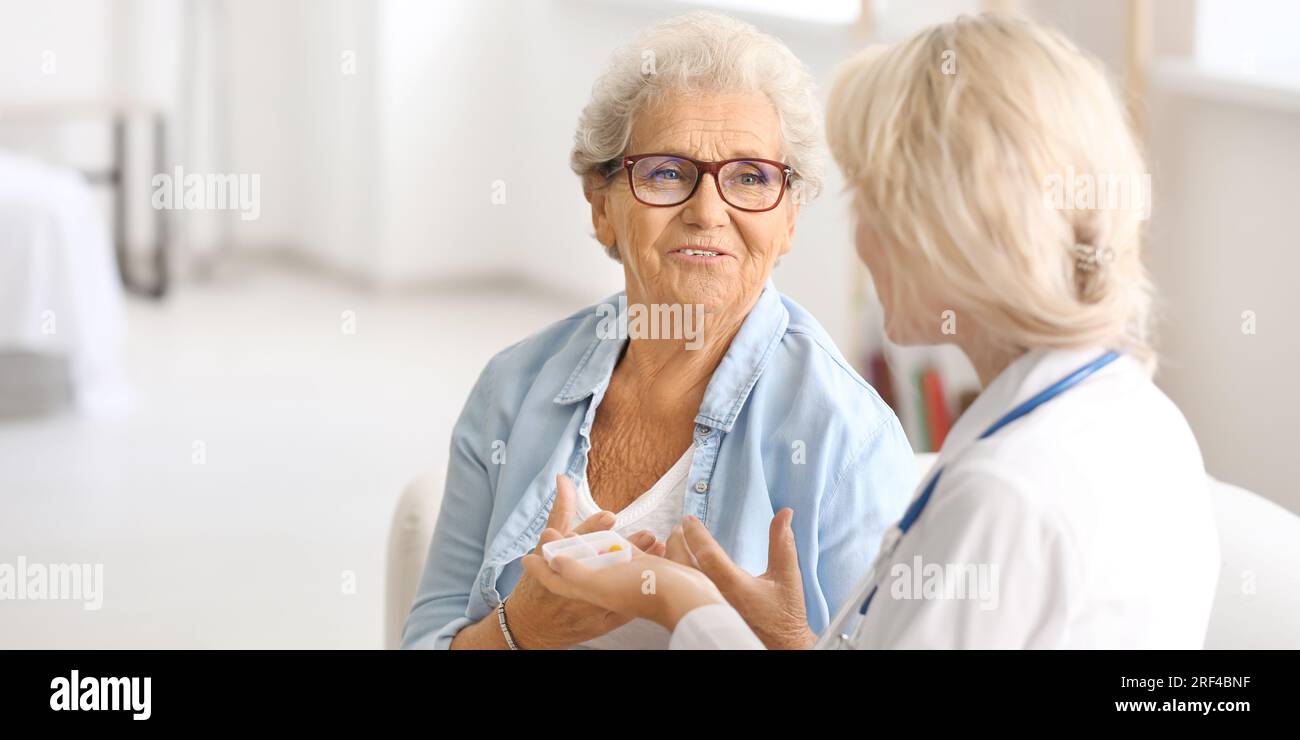 Doctor giving help box hi-res stock photography and images - Alamy