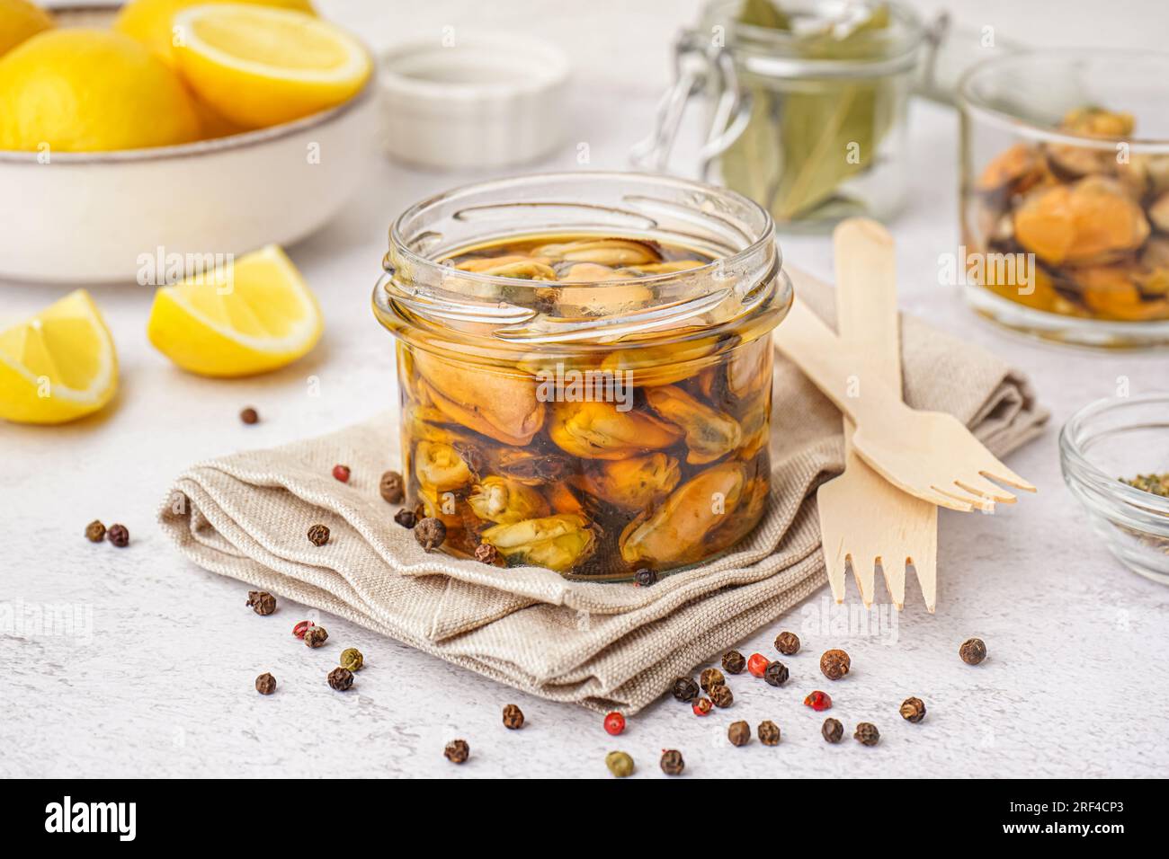 Jar with pickled mussels on white background Stock Photo Alamy